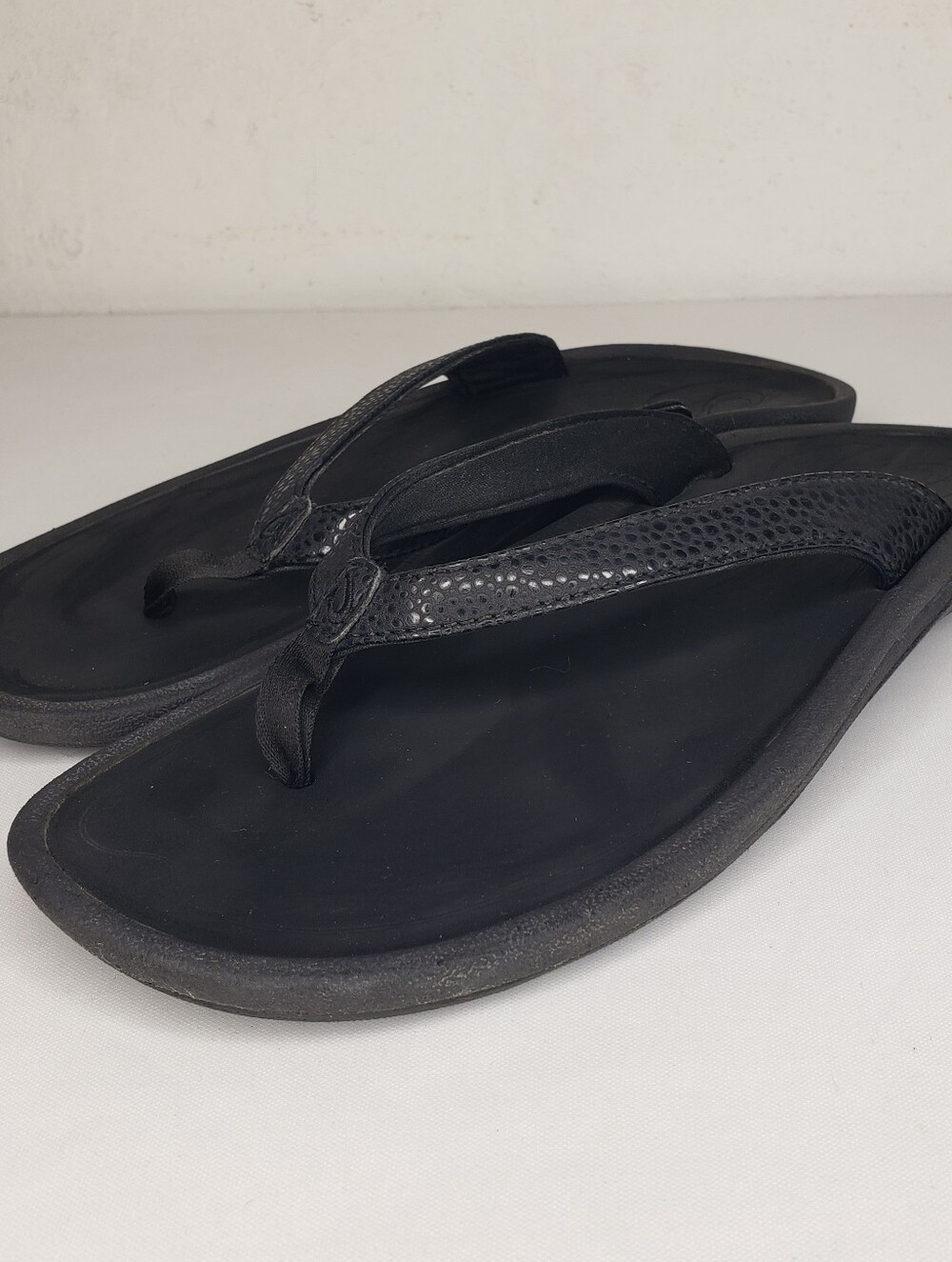 OluKai Black Textured Leather Toe-Post Sandals